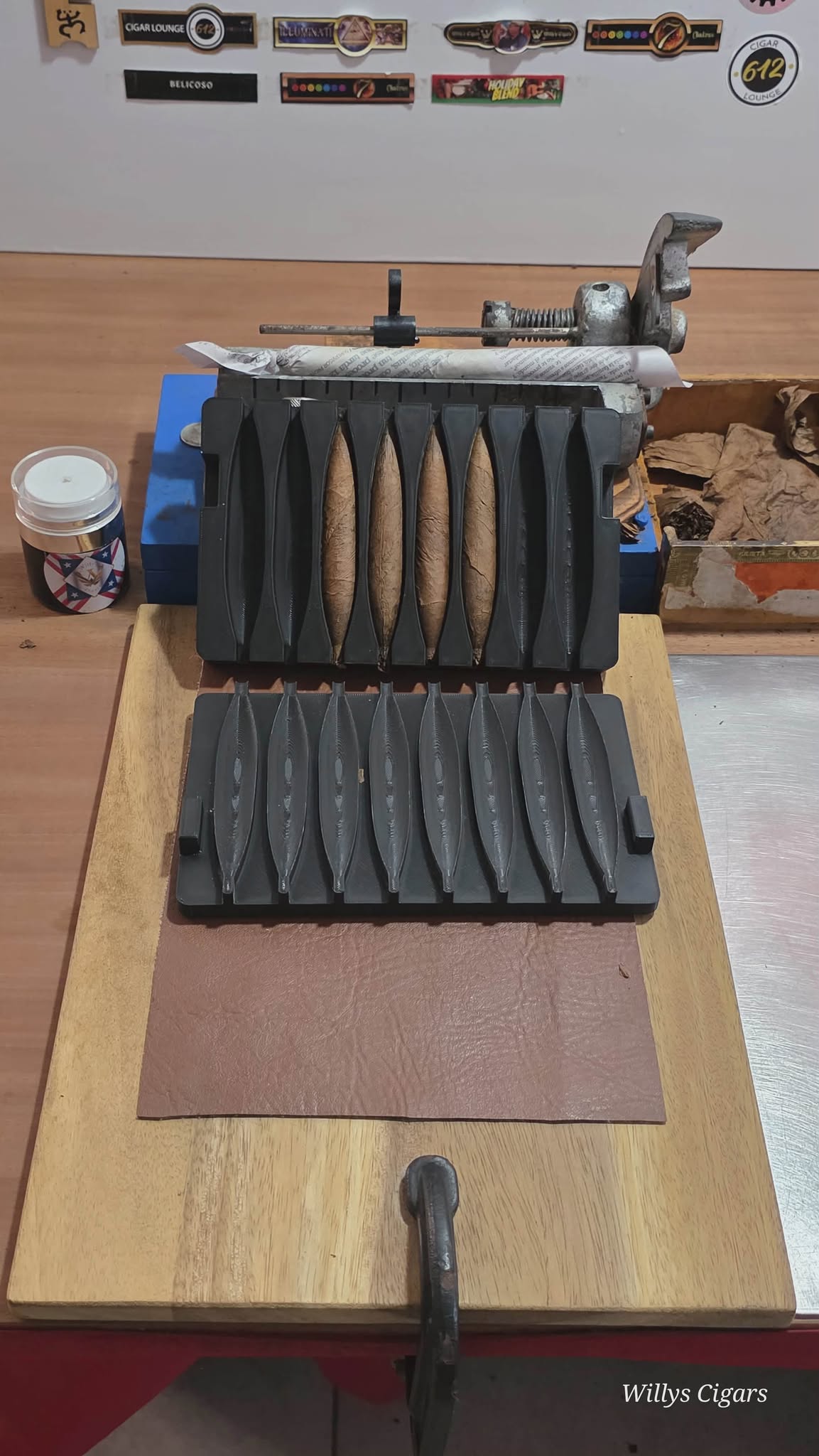 Perfecto mold in use during cigar rolling